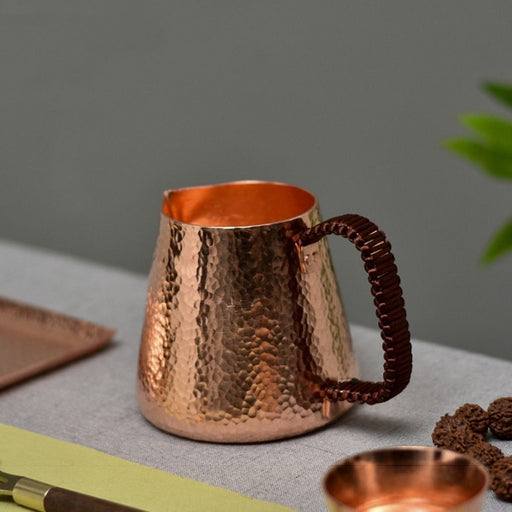 Hammered copper milk jug