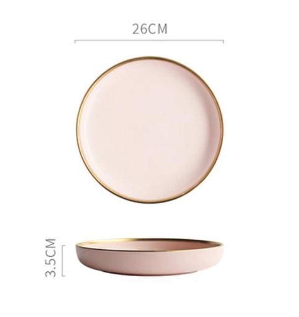 pink and gold ceramic plates