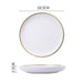 white dinner plate with gold trim